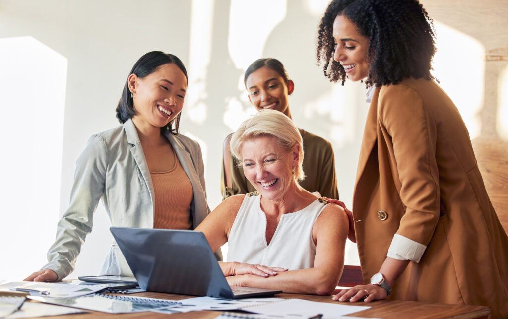 Laptop, planning and business women teamwork, online review and collaboration for company website s